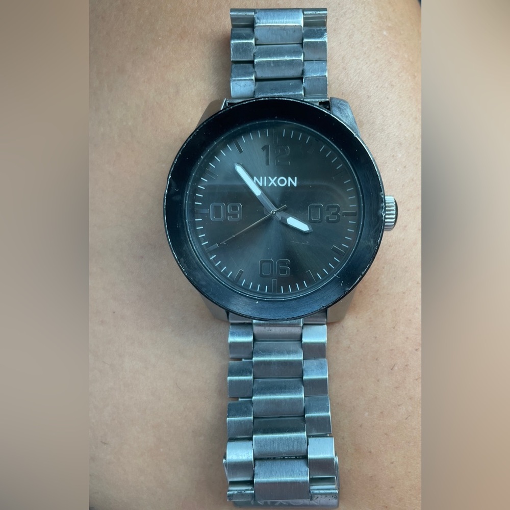 Nixon Men’s Silver Band Black Face Watch